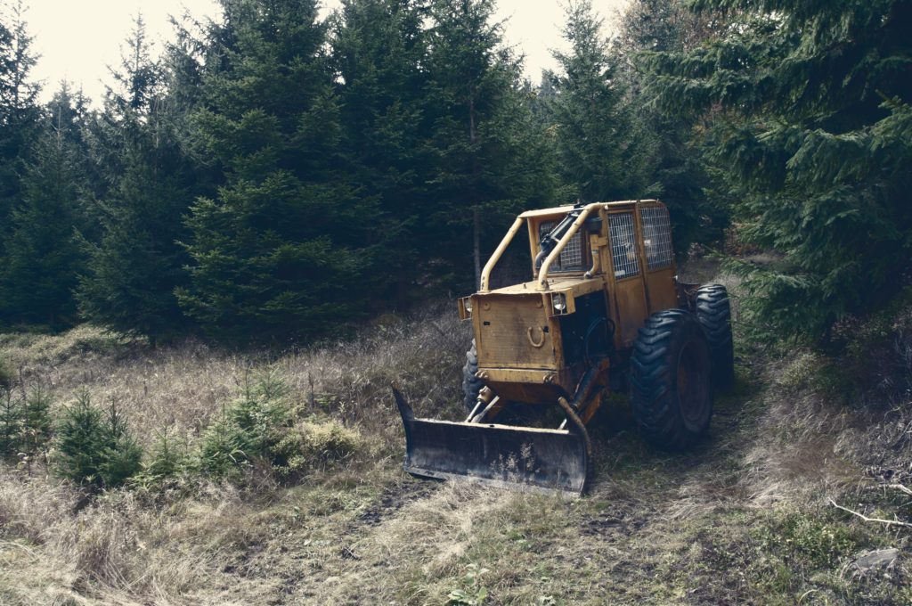 tractor being used for sloping and grading